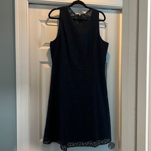 Navy fit and flare lace dress. Really well made. Worn once and dry cleaned.